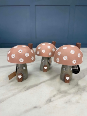 Cute pink mushroom house